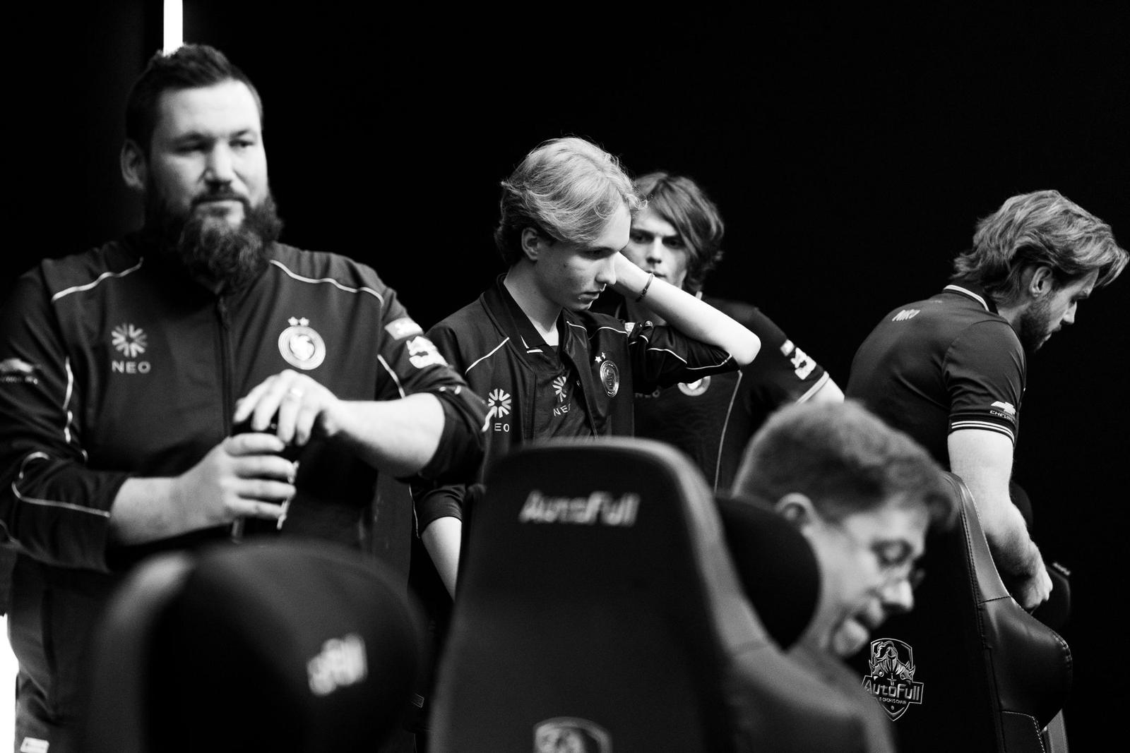 m0NESY and Falcons looking dejected after defeat, greyscale